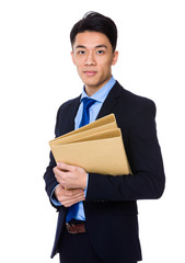 Businessman holding with folder