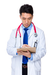 Fototapeta premium Doctor write on report