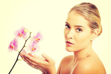 Fototapeta premium Spa woman with purple orchid