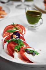 Tomatoes with green sauce
