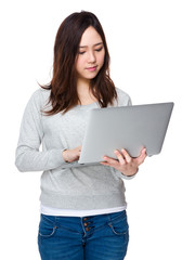 Asian woman use of notebook computer