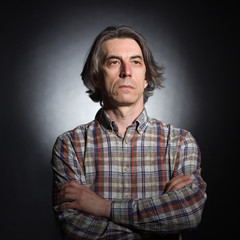 Fototapeta premium Portrait of a serious man aged 40-50 years
