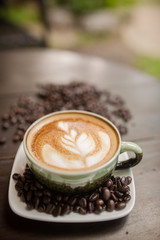 Latte Art coffee with coffee bean