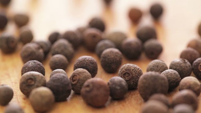 Allspice - pimento seed on rotating display - closeup