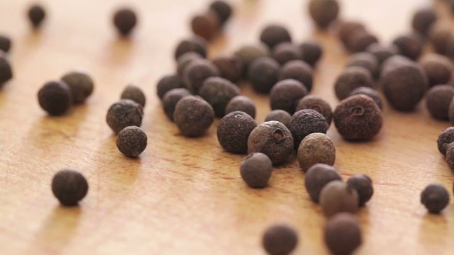 Allspice - pimento seed on rotating display - closeup