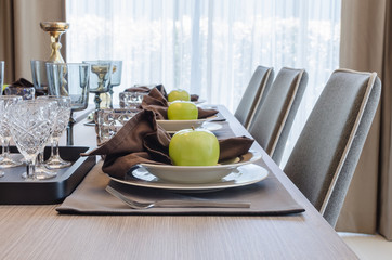 table set on wooden table in dinning room