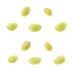 Five single white grapes isolated