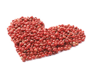 Heart shape made of pepper seeds