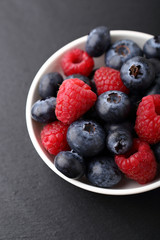 Fresh forest berries in a plate