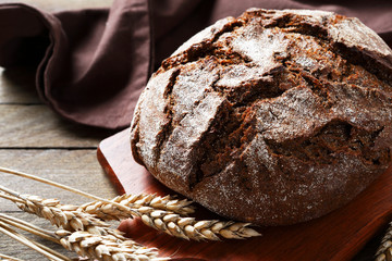 Whole bread on a cutting board