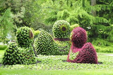 Figure of ducks made from flower bed on flower island of Mainau