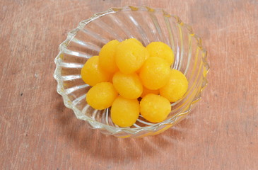 gold egg yolk drop Thai sweet in bowl