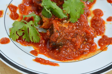 instant can fish in ketchup on dish