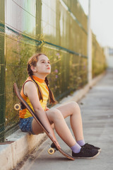 girl with skateboard © roggozub