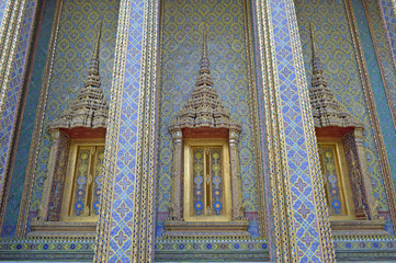 Thai style pattern wall and windows at Wat Ratchabophit, Bangkok, Thailand