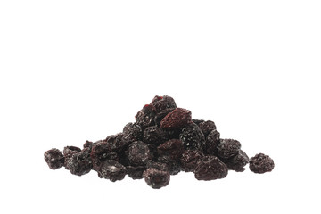 Pile of dried dark cherries isolated