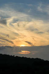sunrise clouds and mountain near reservoir in Phuket Thailand