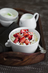 cottage cheese with strawberries in a vintage tray 