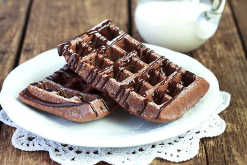 Homemade chocolate waffles with cocoa  from whole wheat flour