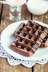Homemade chocolate waffles with cocoa  from whole wheat flour