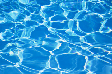 Fototapeta na wymiar Simming Pool, Sun and Light Reflections in Pool Water