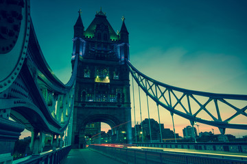 Fototapeta na wymiar Tower Bridge in London at twilight, vintage effect