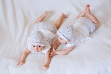 Funny twins sisters babies