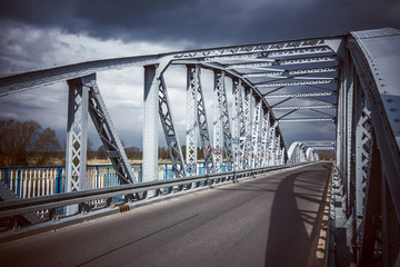 Fototapeta premium Vintage heavy metal bridge construction.