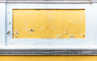 cracked yellow paint color concrete wall,texture background