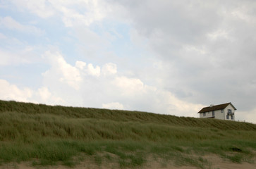 Fototapeta na wymiar House on the dunes in the Netherlands