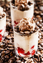 Coffee and chocolate dessert with ice cream and strawberries, se