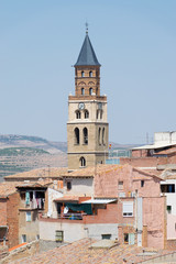 Fototapeta na wymiar Campanario de la Iglesia San Pedro de Fraga en Aragón, España