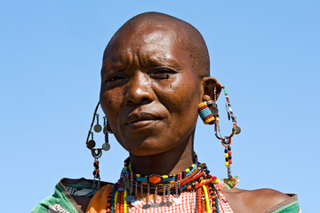 Portrait of a Maasai woman with traditional jewelry.