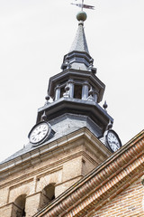 clock and bell tower in a medieval Spanish city
