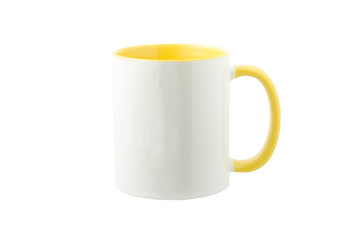 white mug with yellow handle on a white background