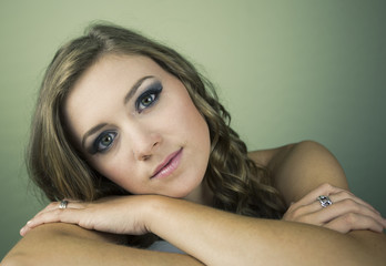 Fototapeta premium Beautiful young woman on green background