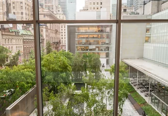 Foto op Plexiglas Manhattan skyline from modern huge windows © jovannig