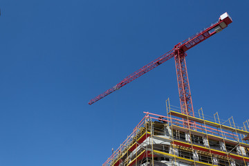 Immobilien Baustelle- Gebäude mit Gerüst - 