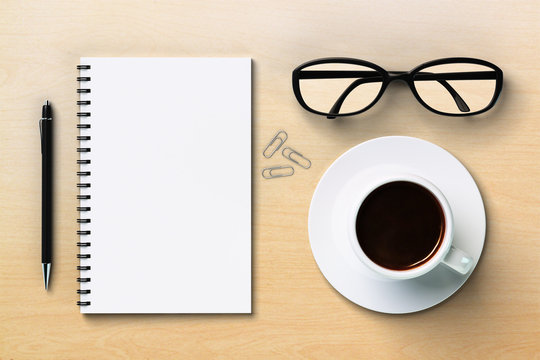 Blank diary and coffee cup