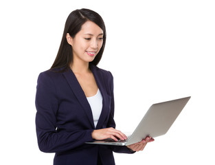Businesswoman use of portable computer