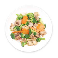 stir fried chicken with broccoli and carrot on plate isolated white background, top view