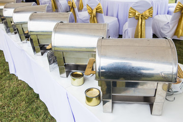 Many buffet heated trays ready for service.