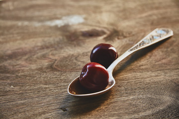 cherries in the spoon