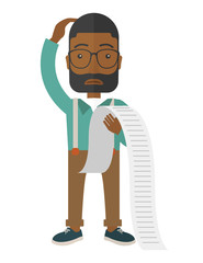 Sad african-american employee holding a list of payables.