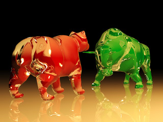 Red glass bear figure confronts green glass bull figure, stock market concept 