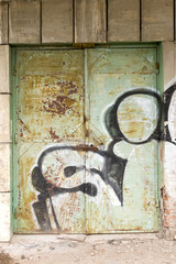Graffiti Covered Old Disused Metal Doorway