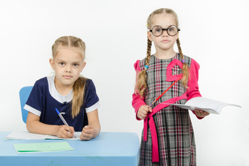 Children playing in the teacher and student