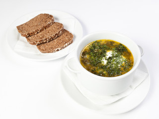 The soup in the white bowl