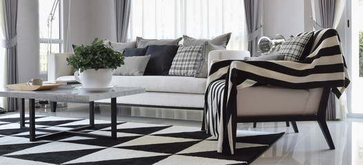 modern living room interior with black and white checked pattern