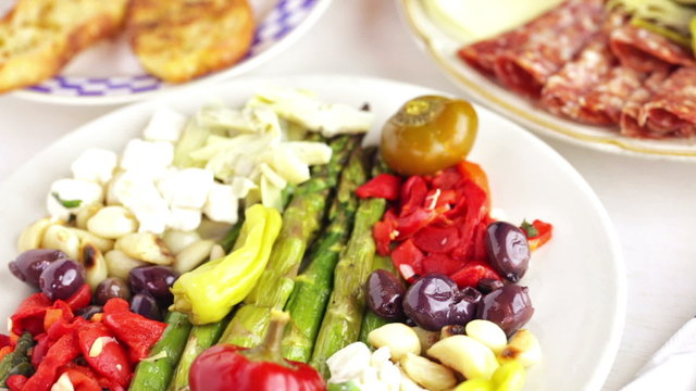 Appetizers plate with vegetarian antipasto in Italian restaurant.